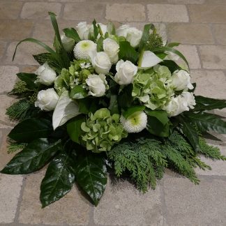 Petit coussin rond blanc