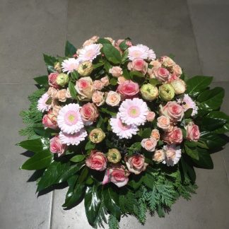 Coussin rond tons de roses
